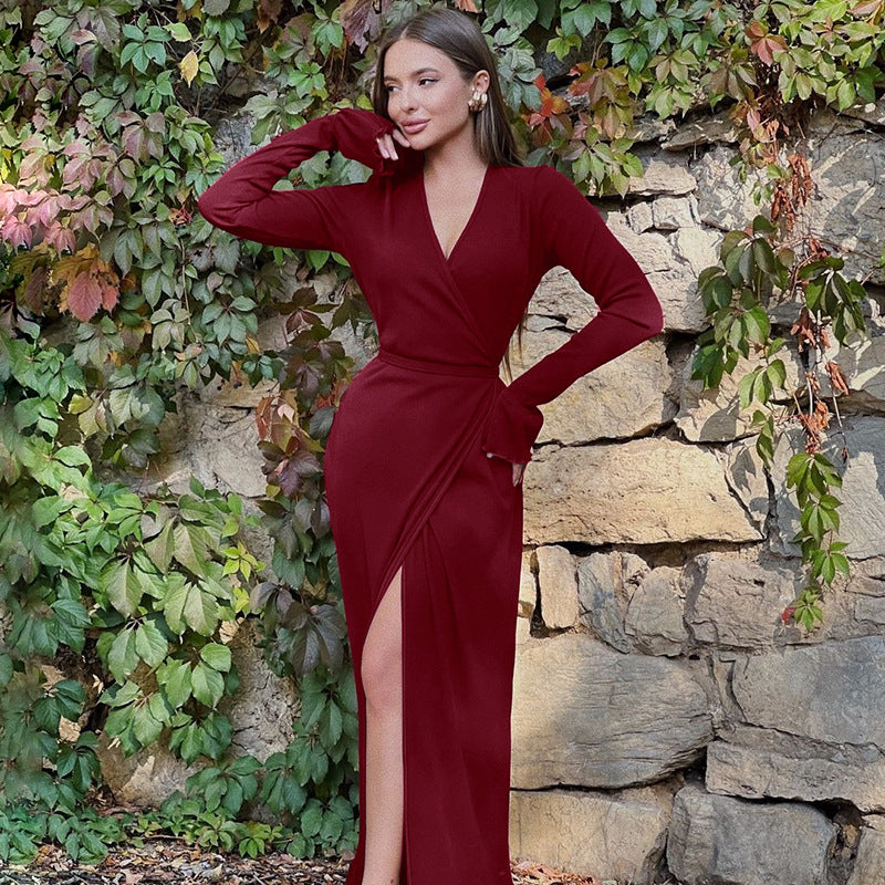 Burgundy wrap-style maxi dress with long sleeves and side slit for fashionable occasions