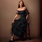 Gothic-style black lace dress with off-shoulder design for elegant fashion ملابس