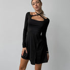 Black Elegant Knitted Dress featuring a unique cutout neckline detail for stylish fashion