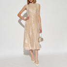 Sleeveless champagne sequined midi dress with high neckline for elegant fashion ملابس