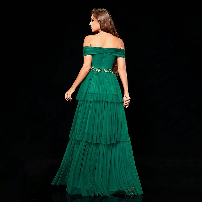 Elegant off-the-shoulder emerald green gown for a stunning fashion statement in ملابس