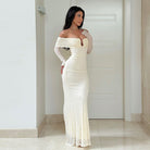 Elegant off-shoulder white sequined evening gown in mermaid silhouette for fashion enthusiasts