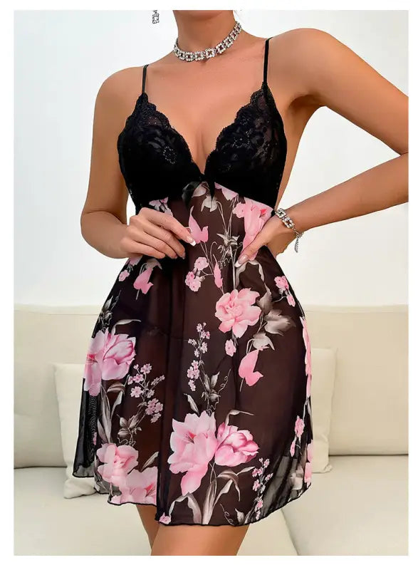 Floral print dress with black lace bodice and spaghetti straps.