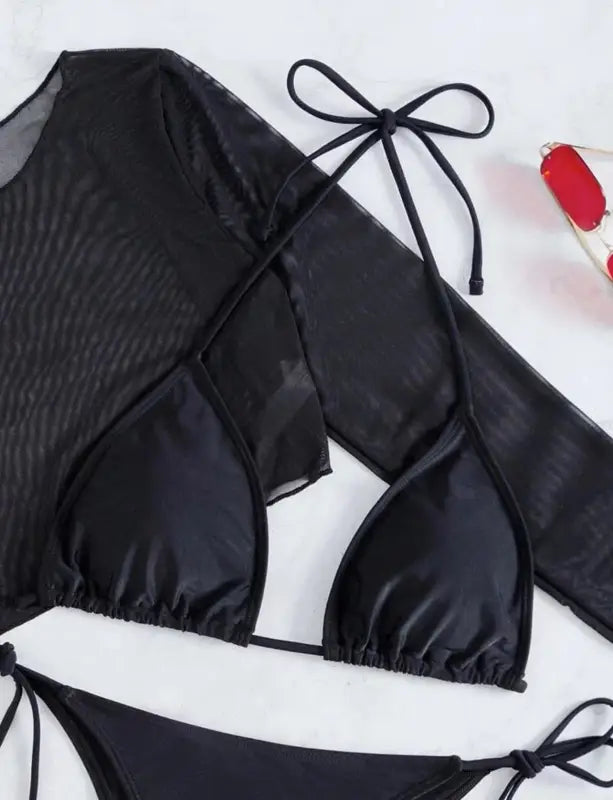 Black long-sleeved bikini top with tie closures.