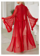 Vibrant red sheer robe with flared sleeves and feathered trim.