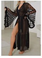 Sheer black robe with wide bell sleeves, heart patterns, and fur trim.