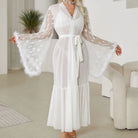 White sheer robe with bell sleeves and a tie waist.