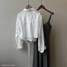 Cropped white button-down shirt and black slip dress next to Comfy Sunrise Cardigan