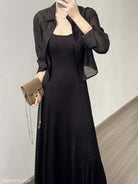 Elegant black maxi dress with sheer jacket and handbag, styled with Comfy Sunrise Cardigan