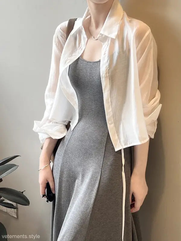 Gray sleeveless dress with white shirt styled with Comfy Sunrise Cardigan for versatile wear