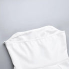 White fabric garment with a high collar or neckline.