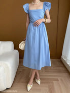 Light blue midi dress featured in the Elegant Flying Dress collection - black sold