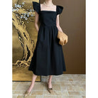 Elegant flying dress featuring a black midi design with square neckline and ruffled sleeves