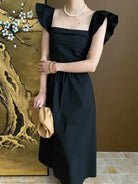 Elegant Flying Dress: Black Ruffled Cotton Midi with Butterfly Sleeves - sold