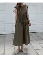 Olive green midi dress with cap sleeves and a drawstring waist.