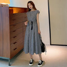 Gingham midi dress with cap sleeves and a gathered waist.