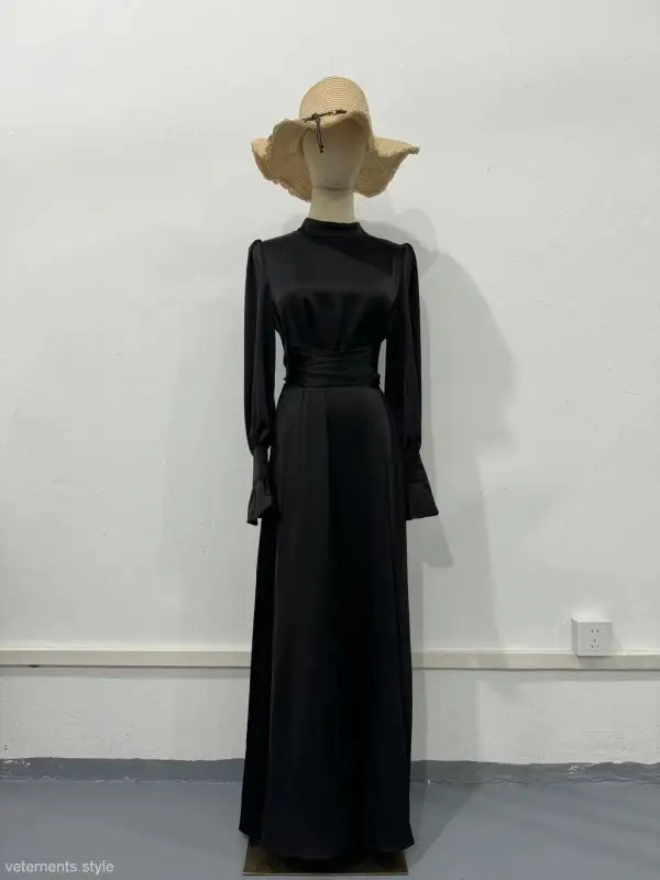 Elegant puff sleeve dress with a high neck, long sleeves, and beige wide-brimmed hat