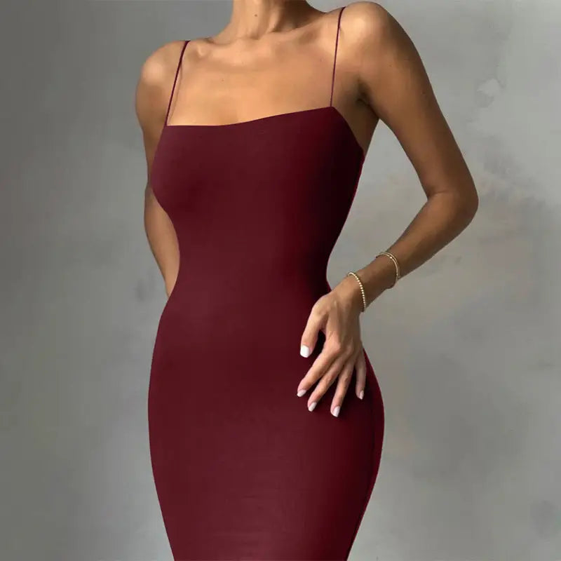 Burgundy bodycon dress with thin spaghetti straps.