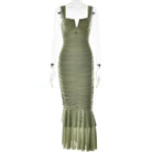 Olive green ruched mermaid-style dress with a sweetheart neckline and flared hem.