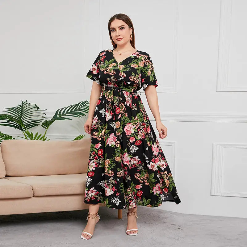 Floral print maxi dress with short sleeves and a belted waist.