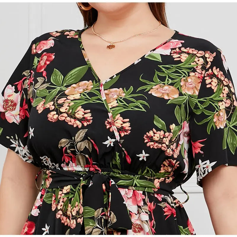 Floral print wrap dress with short sleeves and a V-neckline.