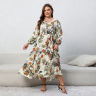 Floral print maxi dress with long sleeves and a ruffled hem.