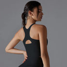 Black racerback athletic top with a cutout detail on the back.