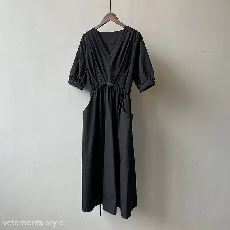 Black midi dress with V-neck and puff sleeves on hanger from Retro V Neck Pleated Dress