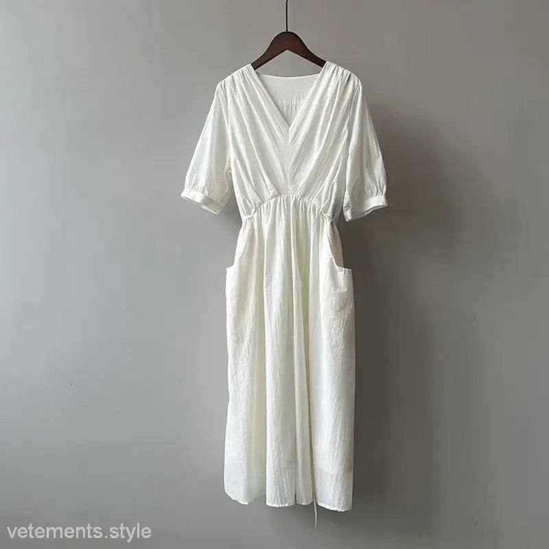 White cotton Retro V Neck Pleated Midi Dress with puffed sleeves and side pockets