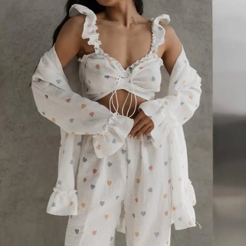 White heart-patterned crop top and matching robe set with ruffled details.