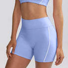 Light blue high-waisted workout shorts with a white side stripe.