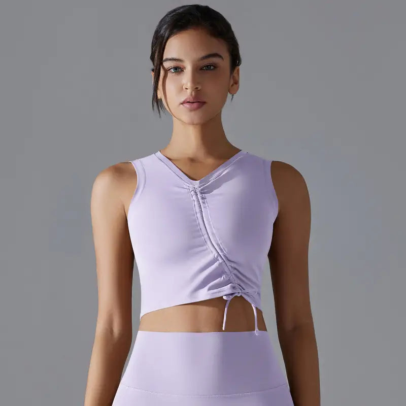 Lavender crop top with ruched front detailing and drawstring.